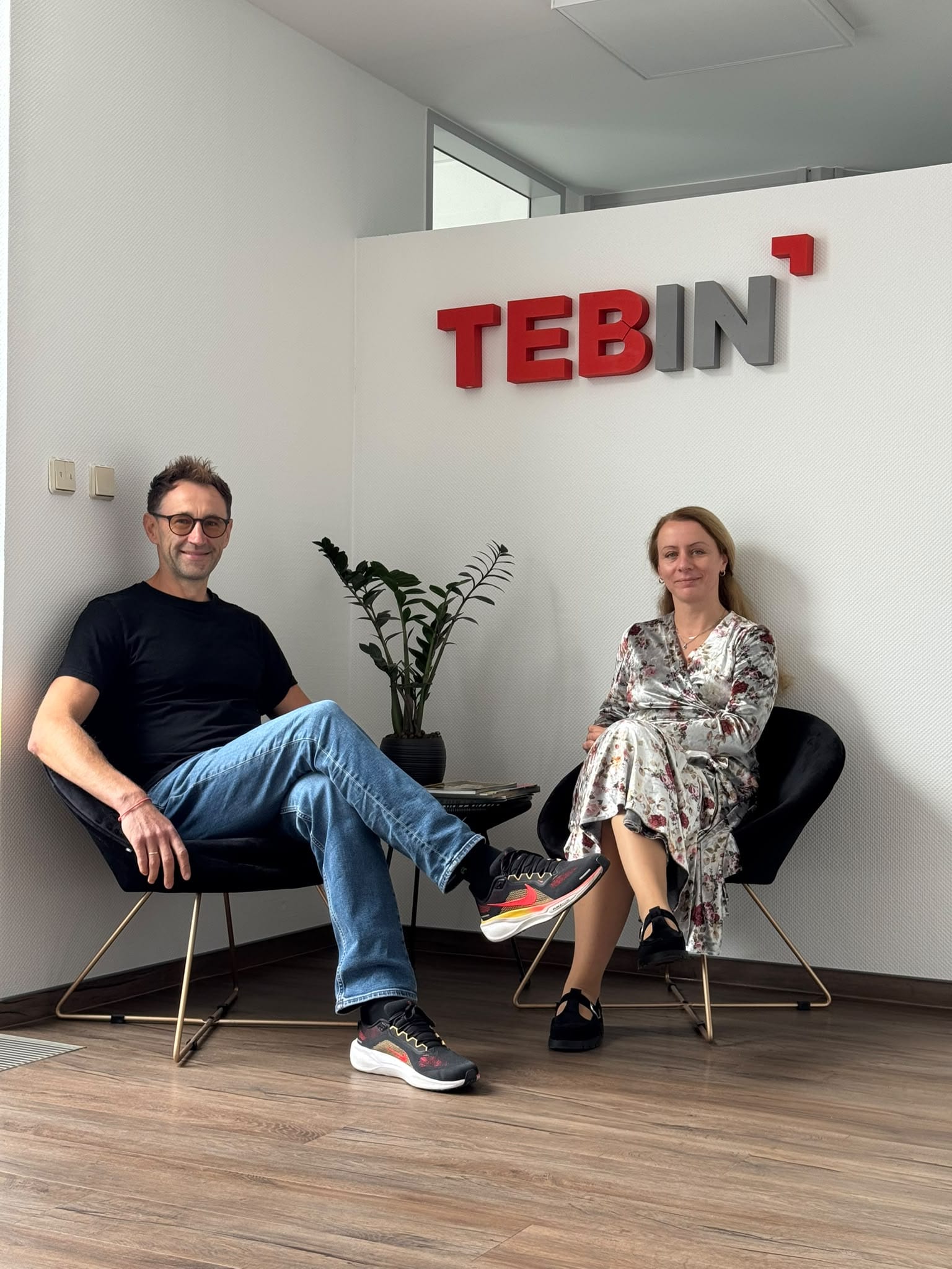 Alexander Nikitin and Anna Gudym in the TEBIN office